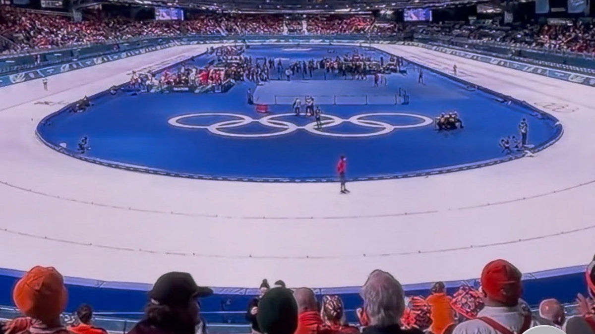 Olympic stadium with the Olympic rings displayed on the central floor