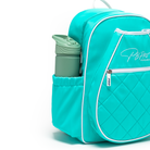 Mint PBPRO Signature pickleball backpack, close-up of side pocket holding a bottle