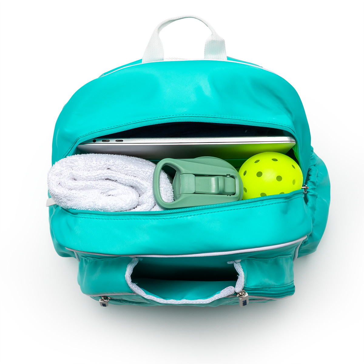Mint PBPRO Signature pickleball backpack, open main compartment holding towel, case and ball